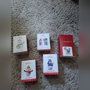 1 set of 5 Hallmark Snowman Ornaments.  For the seasoned Snowman collector.